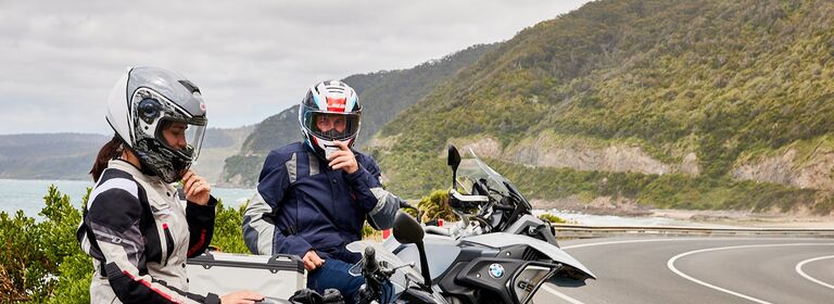 riders stopped on the coast